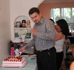 Goerge cutting cake