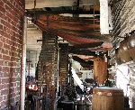 Back of blacksmith shop showing bellows